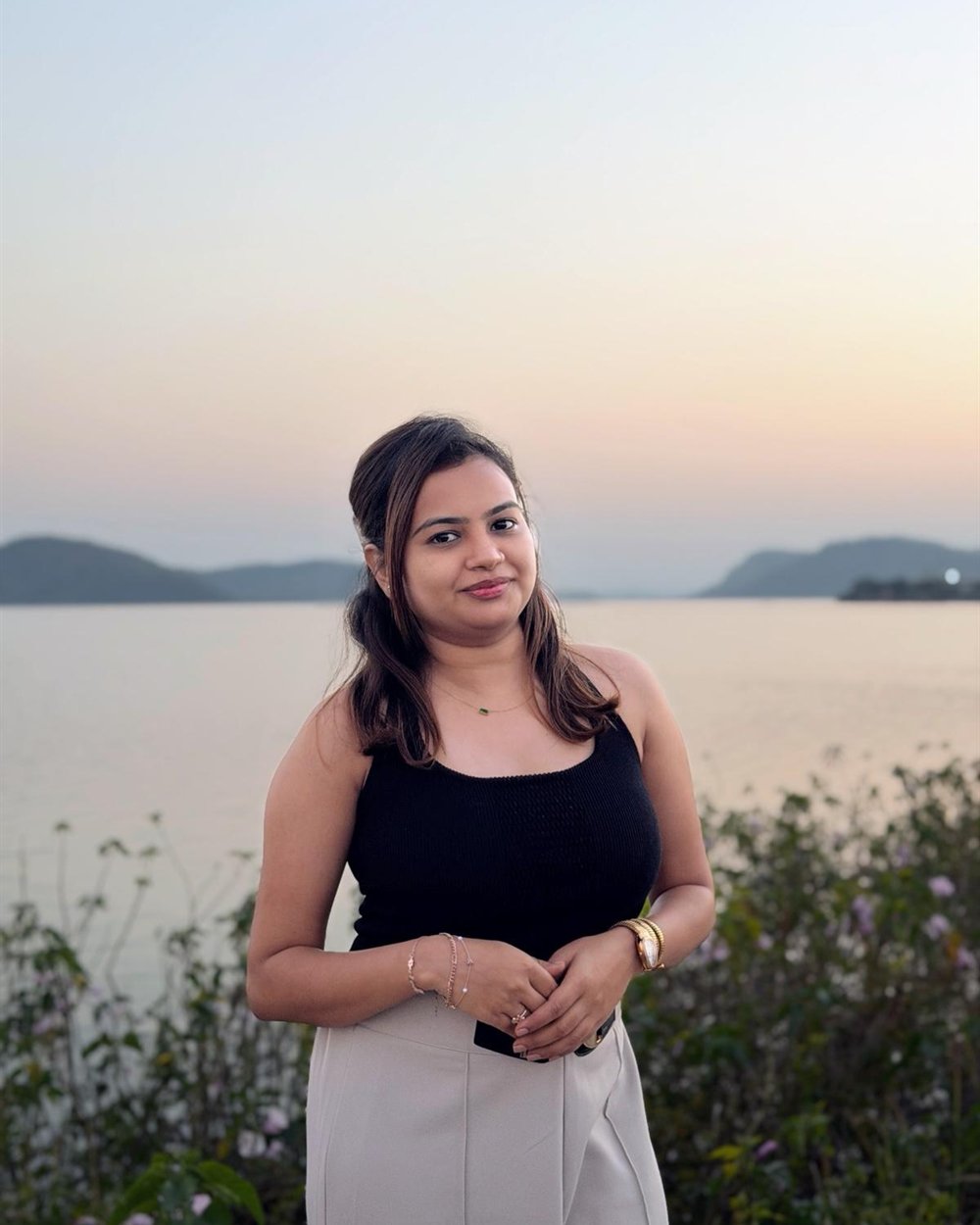 Portrait of Tejal, the designer behind Seedmark Studio, photographed outdoors at sunset.